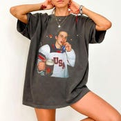 Champion Energy Vintage Graphic Tee | Medal Moment Bootleg Shirt | USA Hockey Celebration Streetwear